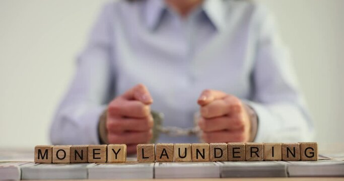 Money Laundering of wooden cubes against arrested woman