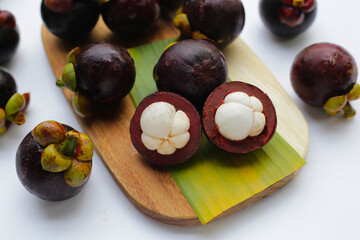 Fresh mangosteen fruit on white background.