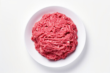 top view ground beef on white plate isolated on white background