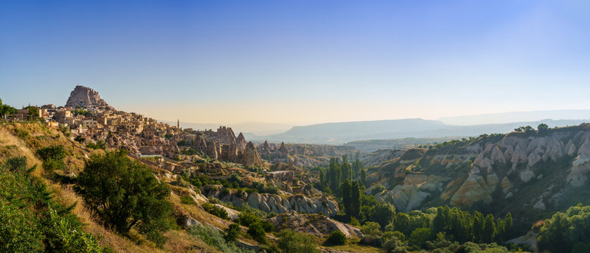 View of Uchisar Castle valley, Ancient town Anatolia amazing landscape, Travel of Turkey Goreme Cappadocia Turkiye, popular tourist destination world heritage unesco. Panorama photo high resolution.