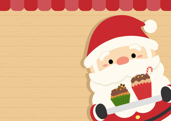 カップケーキを持つサンタクロース
