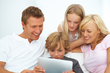 Fototapeta na wymiar Mother, father and kids smile with tablet for elearning, video games or reading ebook story on app at family home. Mom, dad and children watching cartoon, streaming digital multimedia or subscription