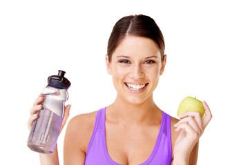 Woman, apple and water bottle in portrait for healthy food choice, wellness and diet on a white...