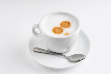cup of cappuccino on the white