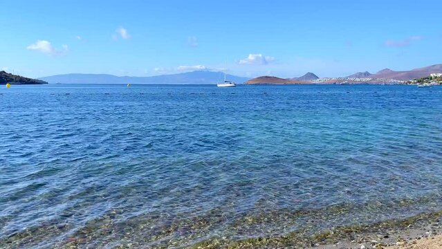 Beautiful calm blue bay with sand beach in Mediterranean. Holiday and relaxation on sea coast