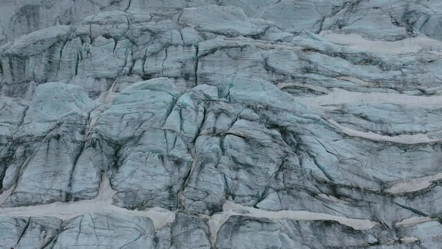 Cracked surface of glacier. Aerial drone view