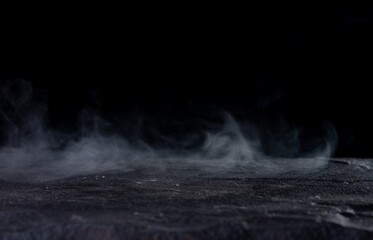 Empty space of Studio dark room concrete floor and smoke background