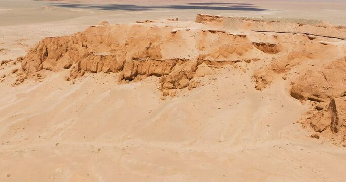 Rock Formations Of Bayanzag Flaming Cliffs In Mongolia - Aerial Drone Shot