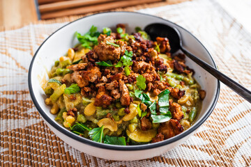 plant-based green curry with cashew and tofu chunks