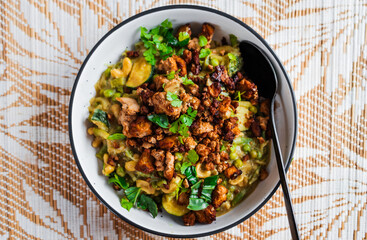plant-based green curry with cashew and tofu chunks