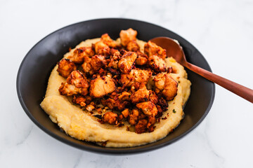 plant-based polenta with marinated tofu chunks