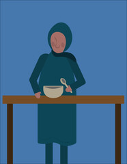 Person in at a table cooking