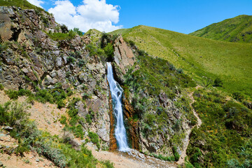 Turgen Bear Waterfall. Turgen Bear Waterfall is located on the territory of the Ile-Alatau National Park. Kazakhstan. Almaty region. Blur effect.