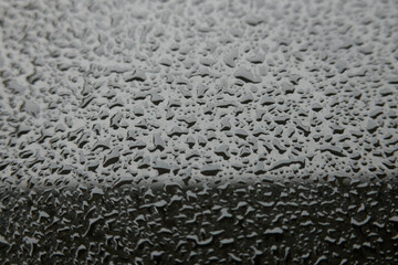 Water drops on the glass surface. - 687815552