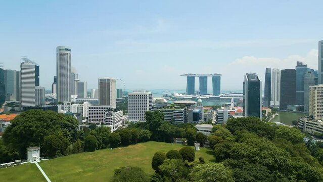 drone ascending over Singapore, rising establishment shot of Singaporean skyline and seaview