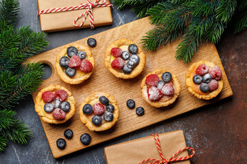 Festive delight: Christmas cupcakes adorned with berries