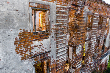 Wall of an abandoned brick building at third floor level