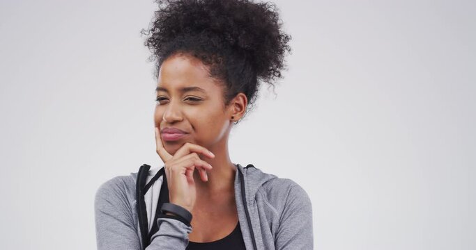 Studio face, uncertain woman and thinking of fitness solution, workout choice or problem solving exercise plan. Unsure, doubt or girl brainstorming training, sports or cardio idea on white background