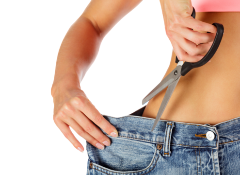 Weight loss concept - closeup shot of woman showing her progress of losing weight. Isolated