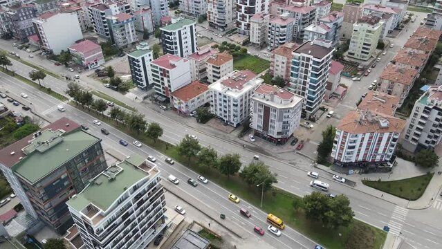 I captured Samsun's cityscape and urban life using a drone. The footage showcases the city's buildings, roads, vehicles, and the dynamic atmosphere. Samsun, located in the Black Sea region of Turkey, 