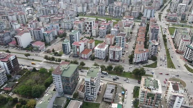 I captured Samsun's cityscape and urban life using a drone. The footage showcases the city's buildings, roads, vehicles, and the dynamic atmosphere. Samsun, located in the Black Sea region of Turkey, 
