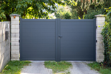 modern grey double gate gray outdoor door aluminum entrance portal of facade house