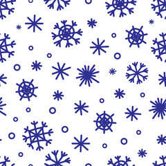 Seamless pattern with vector snowflakes on a white background. Winter doodle print
