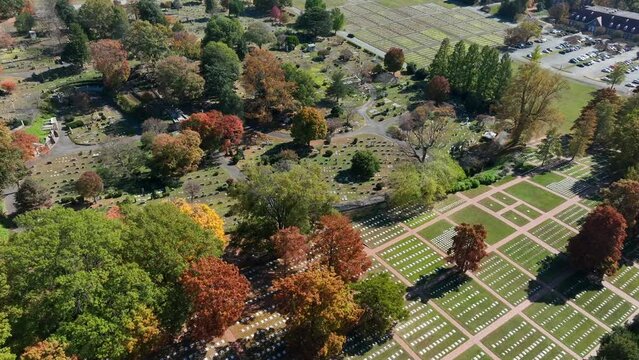 Historic Salem Cemetery in autumn. High aerial establishing shot of old graveyard in Winston-Salem, North Carolina.