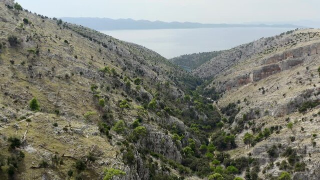 Deserted Mountains At The Monastery Of Pustinja Blaca In Brac Island, Croatia. Aerial Drone Shot