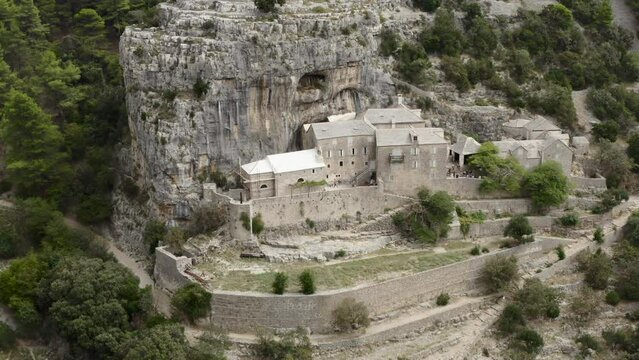 Blaca Monastery Or Pustinja Blaca - Stone Cave Built In Brac island, Croatia. Aerial Drone Shot