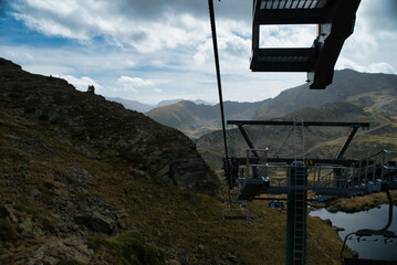 Creussans chairlift in the mountain ski resort of Andorra. Going up to the solar viewpoint of Tristania, Ordino Andorra. Autumn time 