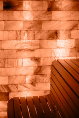 Salt brick wall soft orange color in spa. Salt room in spa.