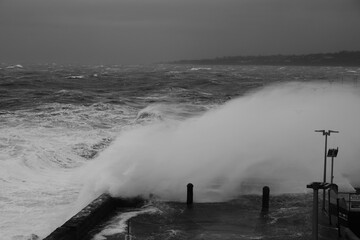 Giant Waves Crashing Over Mornington Jetty. Mornington Pier is a popular destination for a range of...