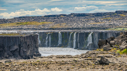 Selfoss, Iceland. The widest waterfall in Iceland Selfoss. Birdview of beautiful Icelandic landscape, huge canyon, and dramatic sky