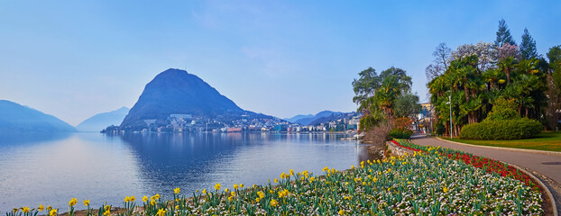 Monte San Salvatore and Lake Lugano behind the flower beds, Lugano, Switzerland