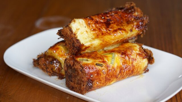 Roti abon gulung (Roll Abon) or meat floss sweet savoury bread roll with shredded meat floss filling topped.