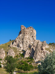 Fototapeta na wymiar View of Uchisar Castle valley, Ancient town Anatolia amazing landscape, Travel of Turkey Goreme Cappadocia Turkiye, popular tourist destination world heritage unesco..