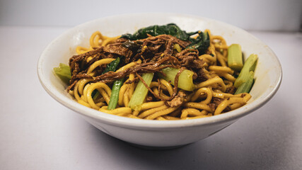 chicken noodles or mie ayam. popular street food in Indonesia