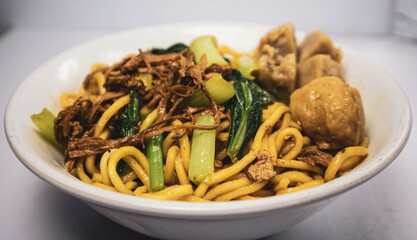 chicken noodle meatball or mie ayam bakso. one of the most popular noodle dishes in Indonesia
