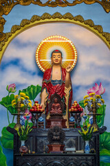 Obraz premium Statue of Hindu Deity overlooking an Asian, religous shrine.