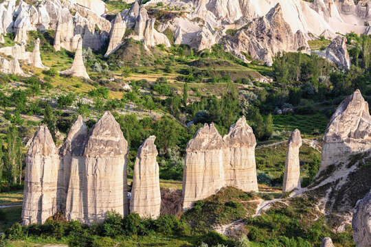 Fairy Chimney rock formations of Cappadocia. Love Valley with stones in form of huge phalluses made by nature. Famouse nature attraction. Goreme, Turkey (Turkiye)