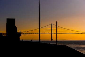 Lisbon Bridge And Monument To Discoveries Riverside Silhouettes