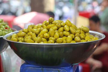 Closeup of Ca na soaked in sugar in Ho Chi Minh City