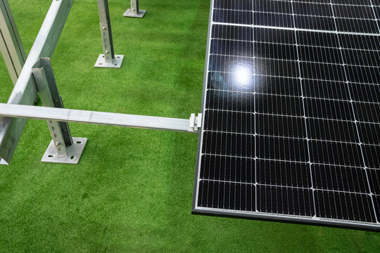 Solar panel on a background of green grass