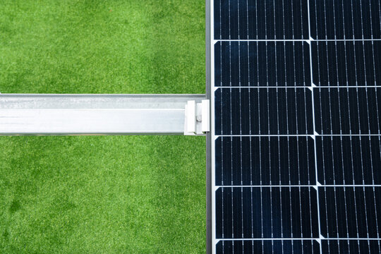 Solar panel on a background of green grass