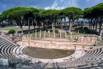 Ostia Antica - The ancient Roman Theatre or Amphitheater. Rome, Italy, UNESCO world heritage site. Roman colony founded in the 7th century B.C..