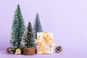 Christmas composition. craft Gift box, small tree, branches and craft DIY decorations on white background. New year concept. Christmas home decoration Flat lay, top view, copy space