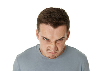 annoyed angry bearded man looking at camera on white studio background