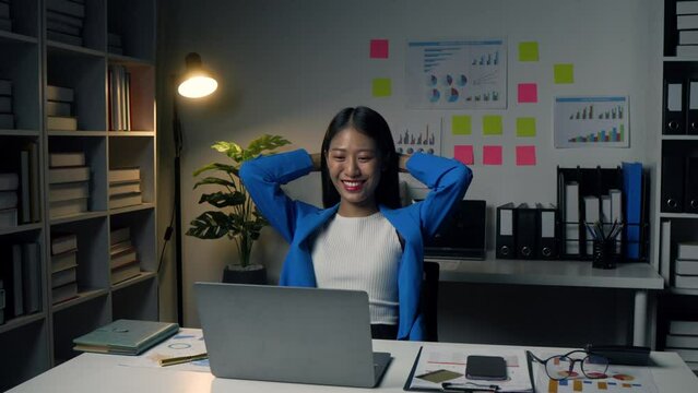 businesswoman is doing a relaxing pose to relieve fatigue after working for a long time.