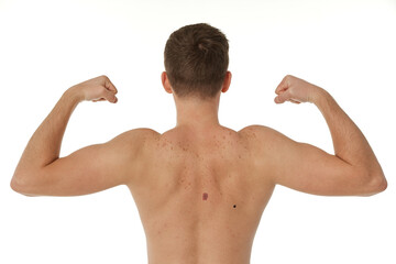 young man showing his bicep over white background. Rear view. perfect body shape